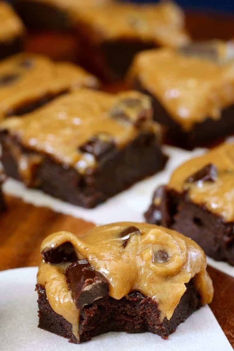 Flourless Caramel Chocolate Chunk Frosted Fudge Brownies