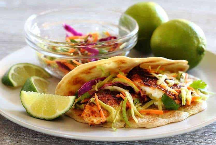 Paleo Spicy Tilapia Baja Tacos with Lime Slaw and Avocado Cilantro Sauce